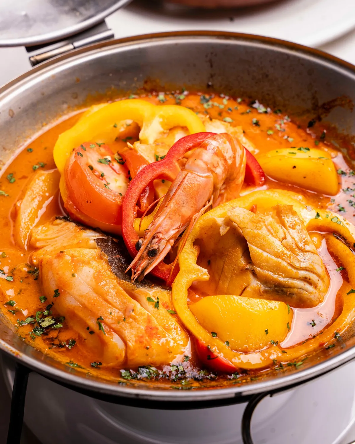 Cataplana with king prawns and fish